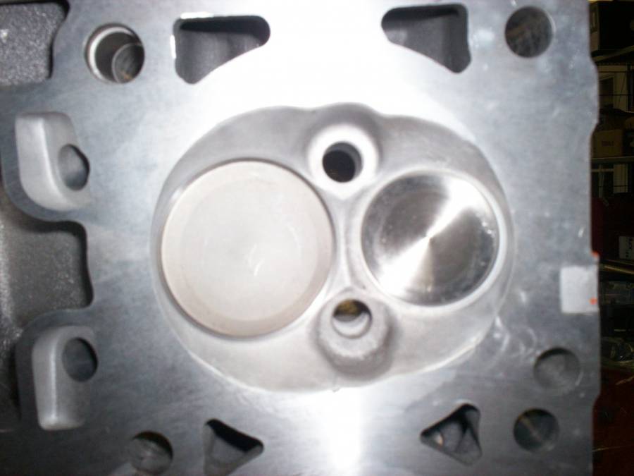 Attached picture Welded up early 5.7 Hemi head chamber.jpg